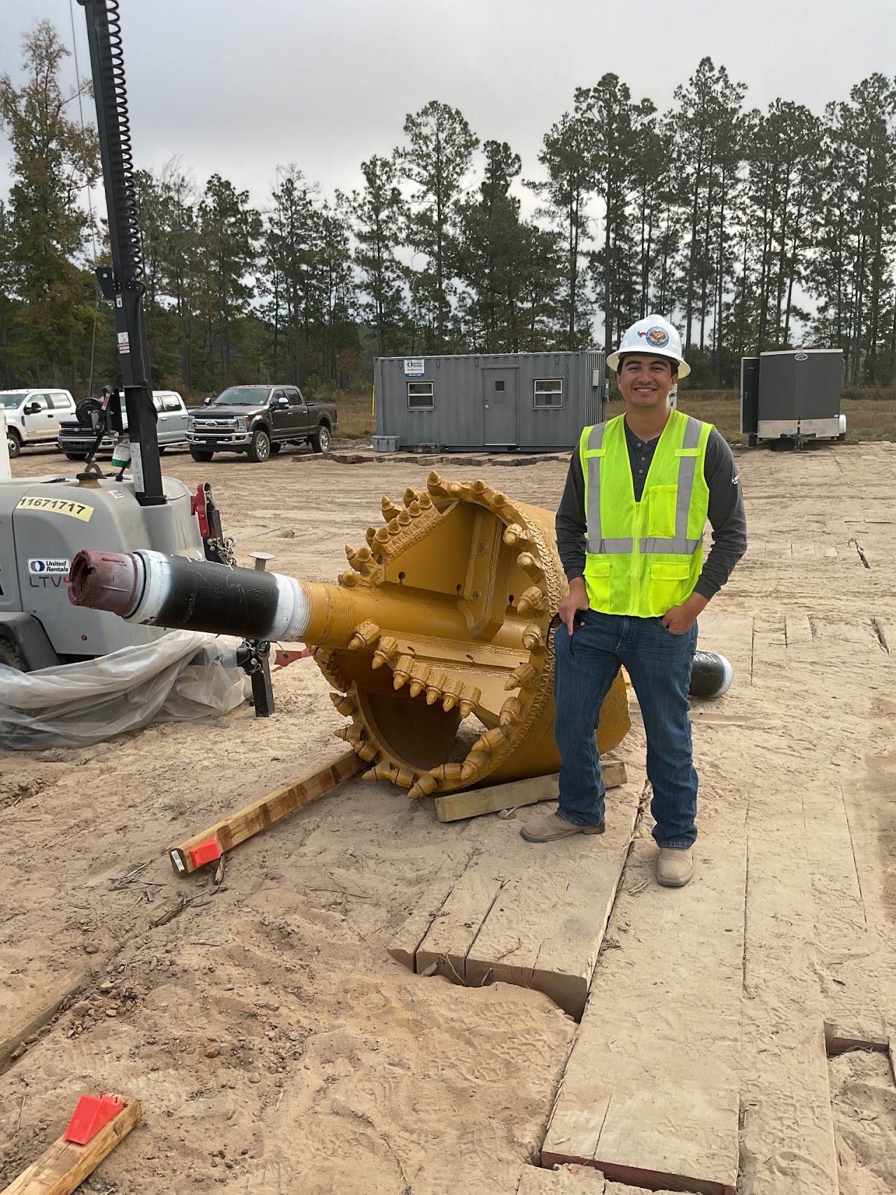 HDD drill bit and tooling staged for trenchless crossing